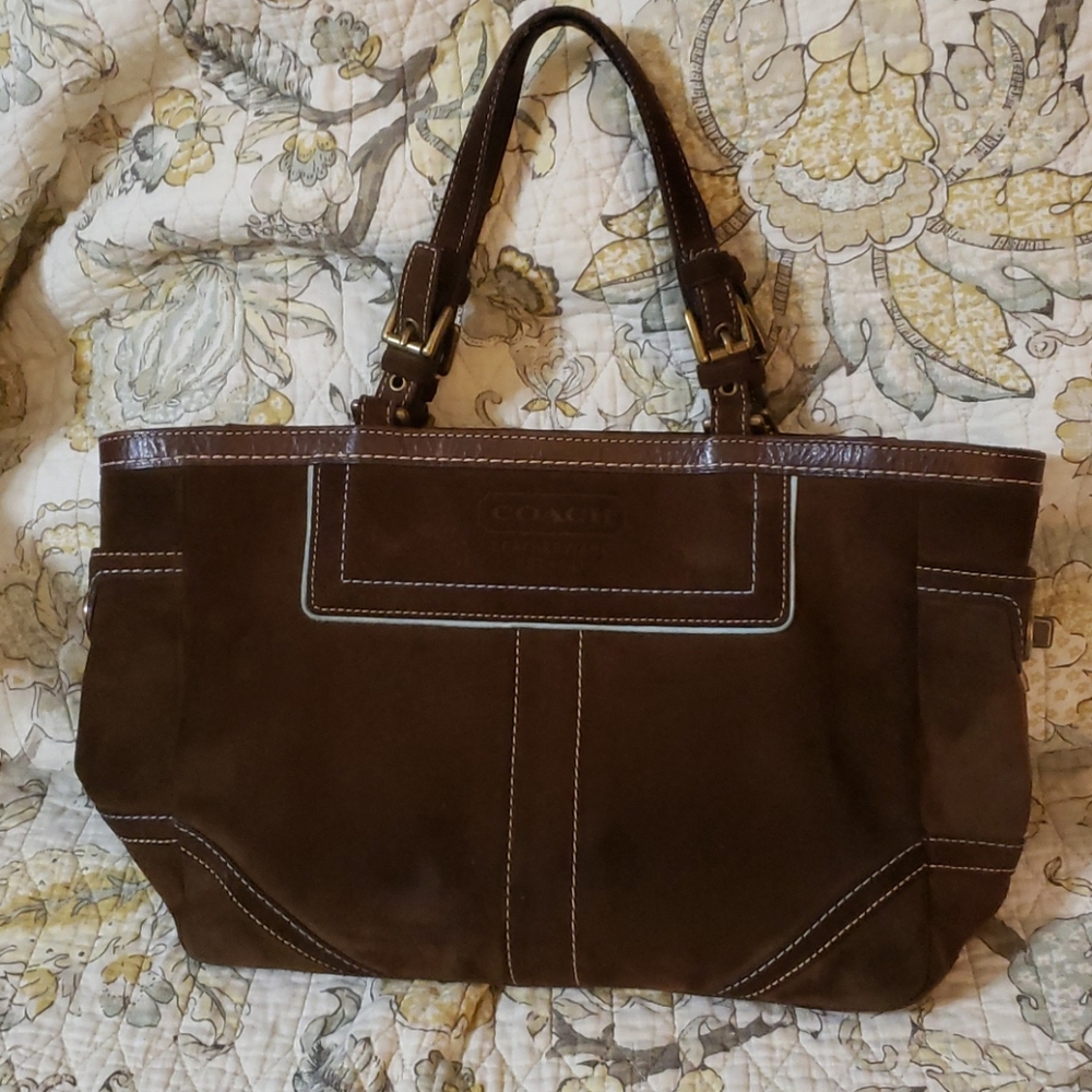 Brown suede Coach purse.